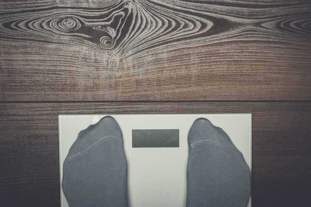 electronic scales on the wooden floor